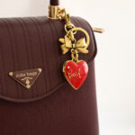 Coach Bow Heart Locket Bag Charm