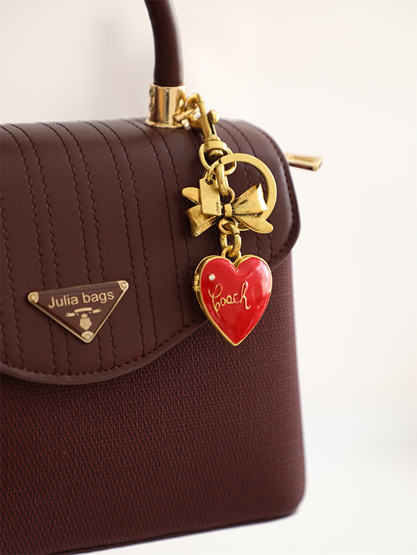 0C7A5706 Coach Bow Heart Locket Bag Charm – Image 1